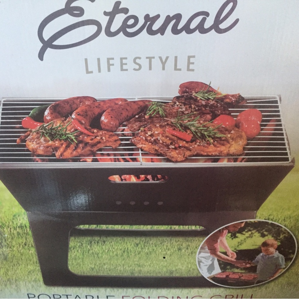 Portable barbecue.NIB. Excellent condition. Great for tailgating or camping.